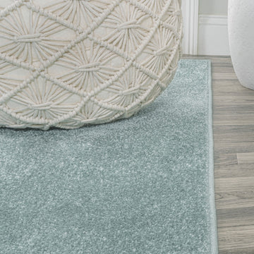 Haze Solid Low-pile Area Rug Light Blue